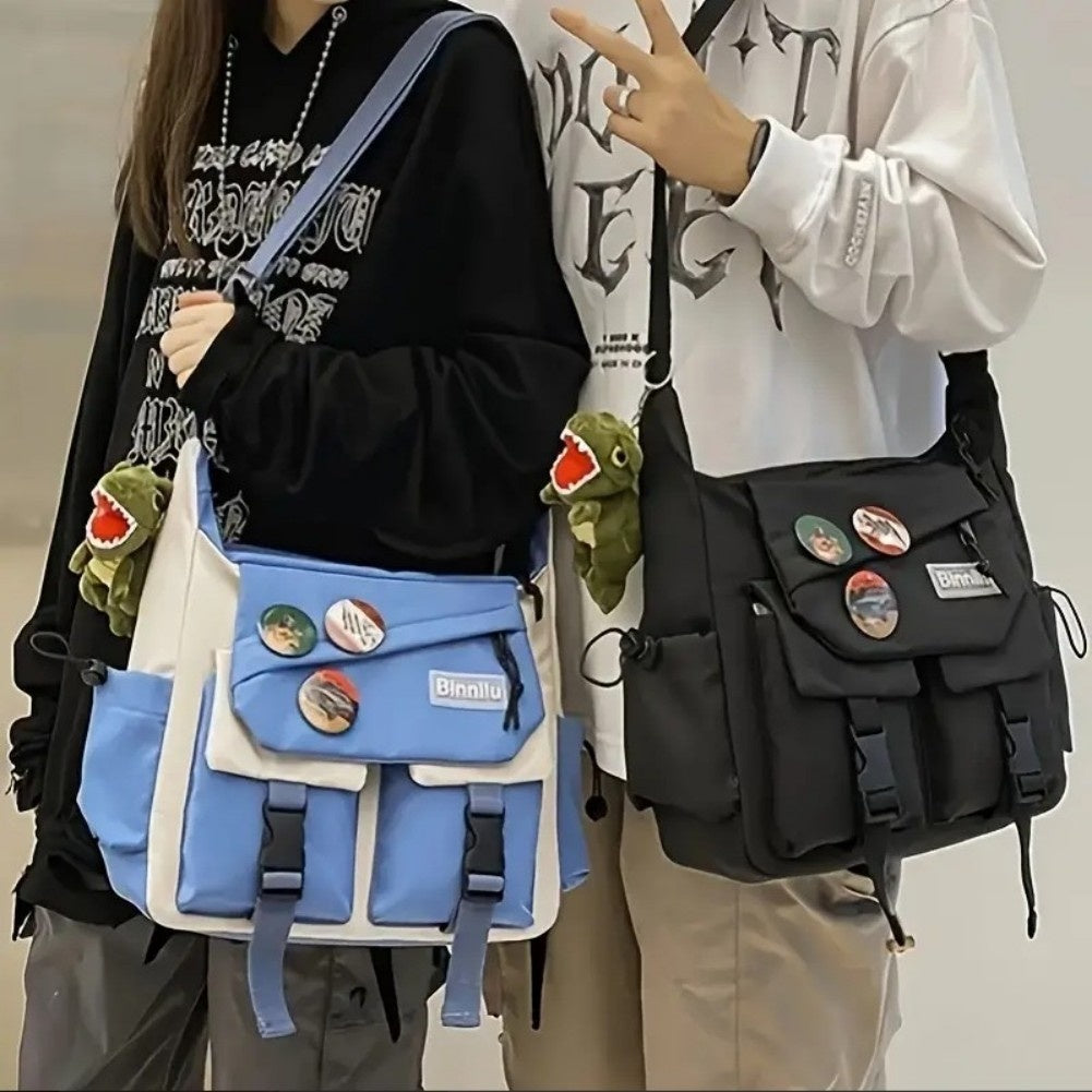Two people holding colorful backpacks with buttons and plushies.